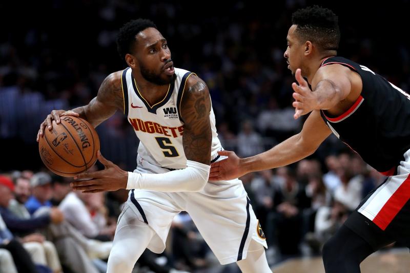 NUGGETS-Will Barton-CJ McCollum-AFP.jpg