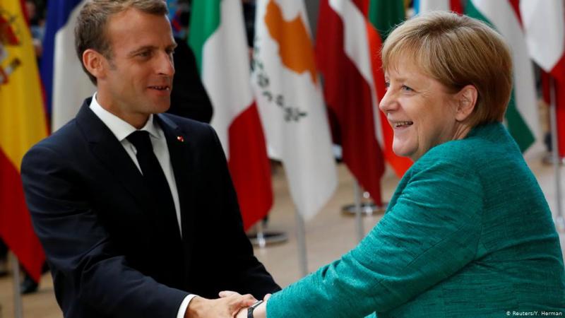 macron merkel reuters.jpg