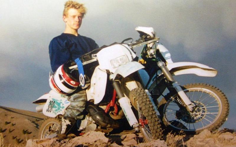 A young Bowe Bergdahl sits on a motorcycle druing_.jpg