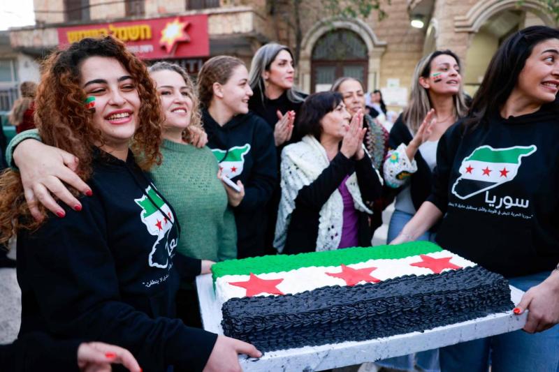 İsrail'in ilhak ettiği Golan Tepeleri'ndeki Dürzi köyü Mecdel Şems sakinleri Esad'ın devrilmesini kutluyor / Fotoğraf: AFP